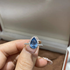 ab-Created Blue Sapphire Teardrop Halo Ring �Pear Cut Simulated Gemstone Engagement Ring in Sterling Silver Pearl Unique
