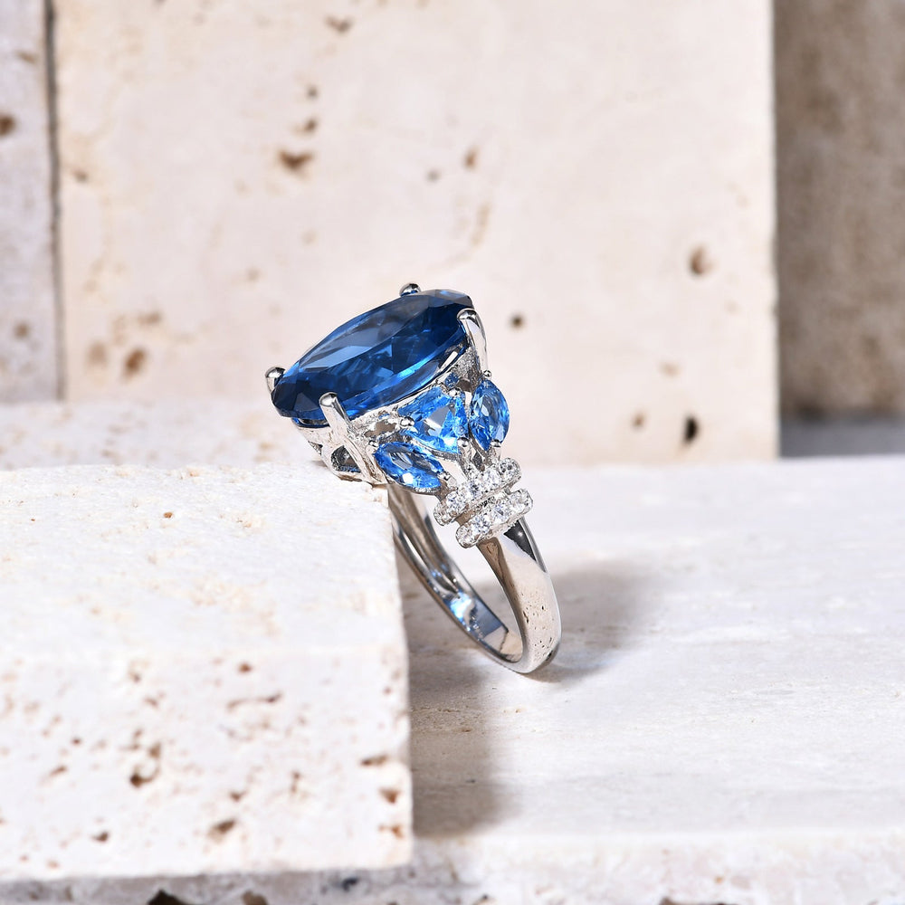 Gala lab blue spinel statement ring on hand — Verse & Hue Jewelry