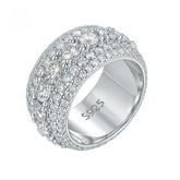 Platinum pavé moissanite-inspired wide band ring, unisex artistic jewelry close-up