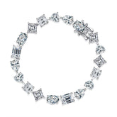 Mixed-shape moissanite tennis bracelet in platinum/18K white gold—heart, pear, oval, emerald cuts