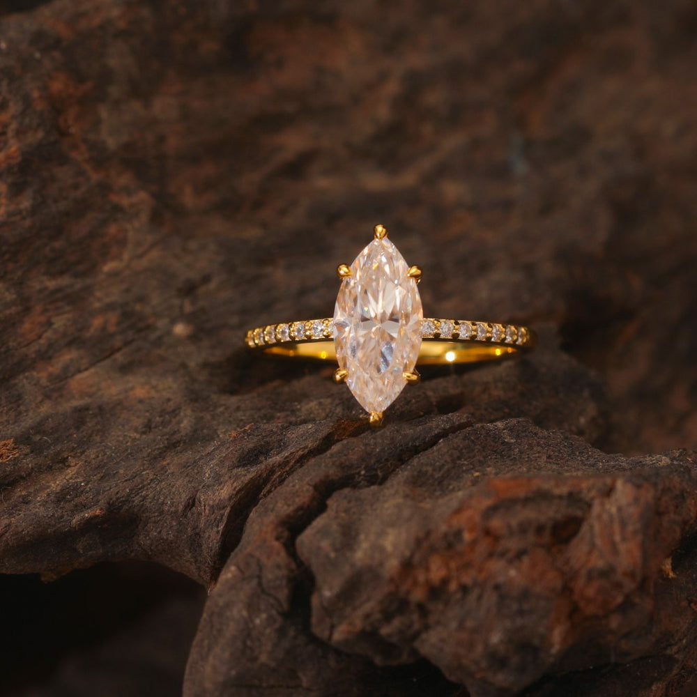 Top view—marquise moissanite engagement ring, minimalist prongs