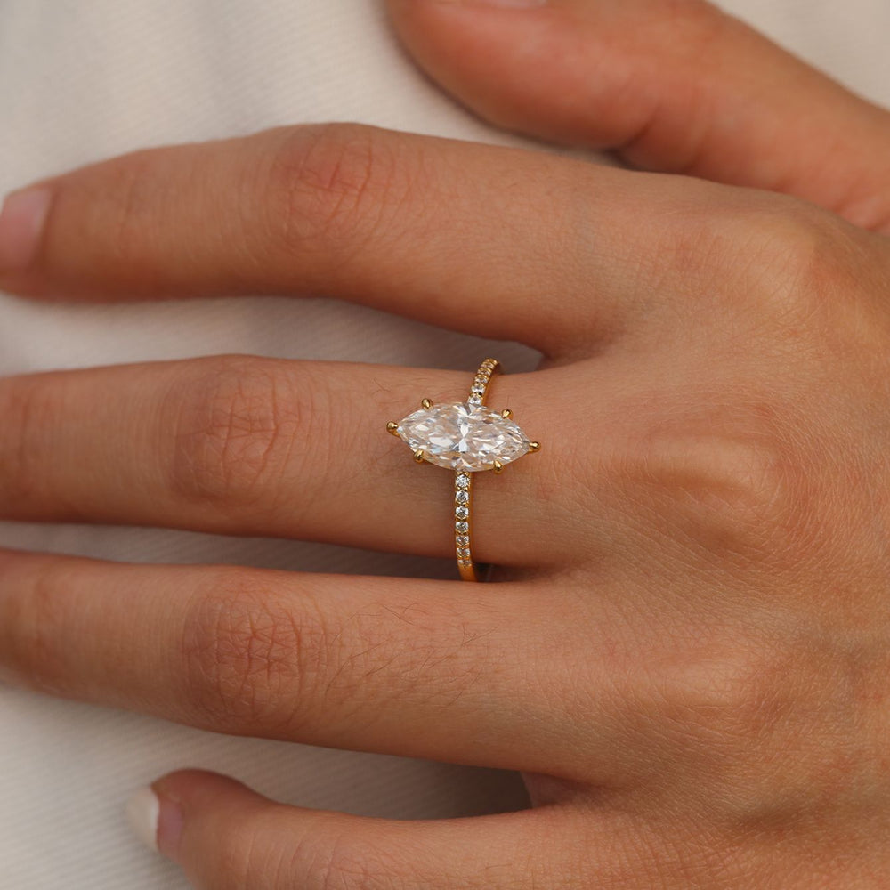 Hand shot—marquise moissanite ring elongated finger look