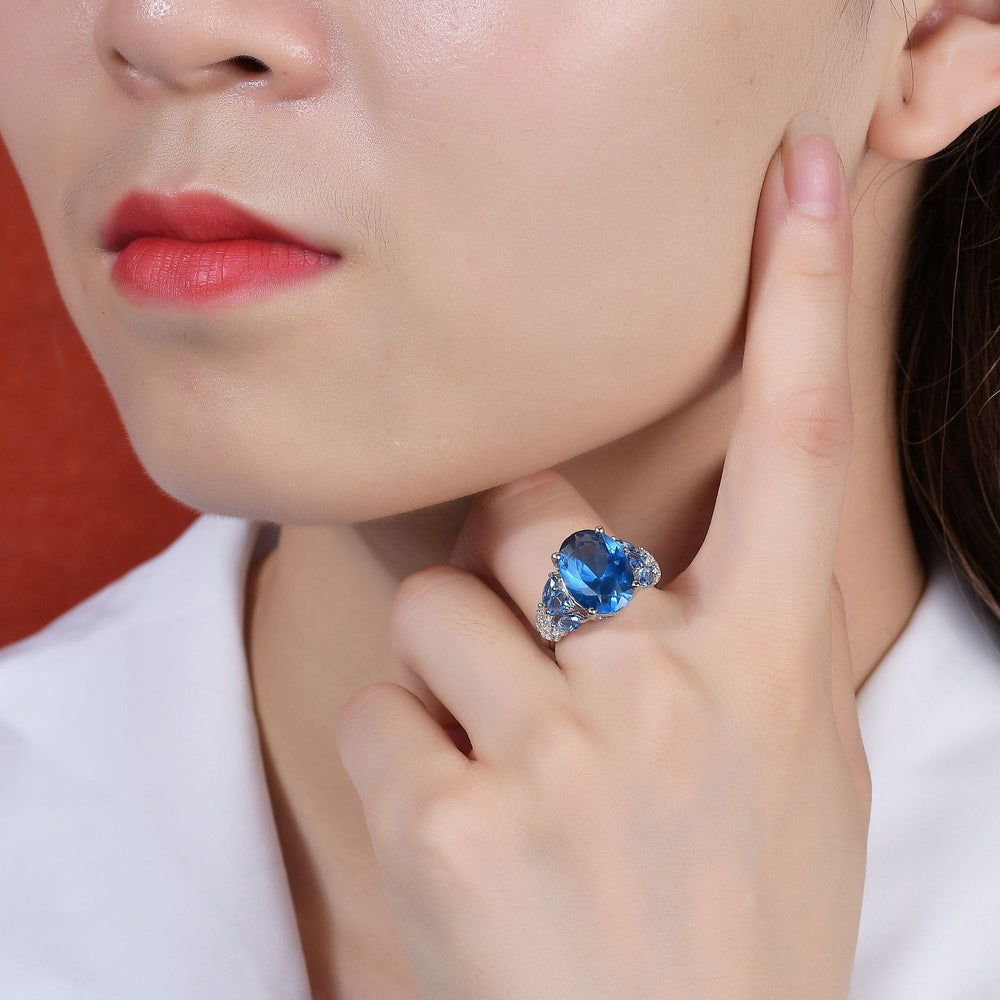 Gala lab blue spinel statement ring on hand — Verse & Hue Jewelry