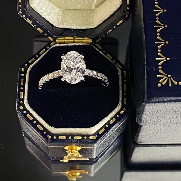 Bridal oval diamond ring on hand — Verse&Hue Jewelry